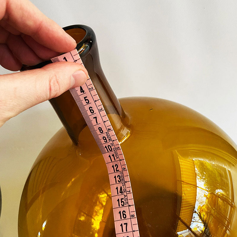 Amber colored glass neckbottle demijohn (vintage), Bohemian / Hungary, 1970s