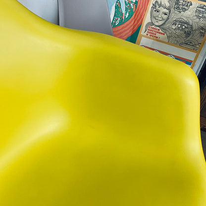 Mustard vintage Vitra, Charles and Ray Eames, DAR Plastic Armchair, USA / Germany, 2009