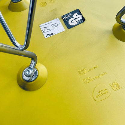 Mustard vintage Vitra, Charles and Ray Eames, DAR Plastic Armchair, USA / Germany, 2009