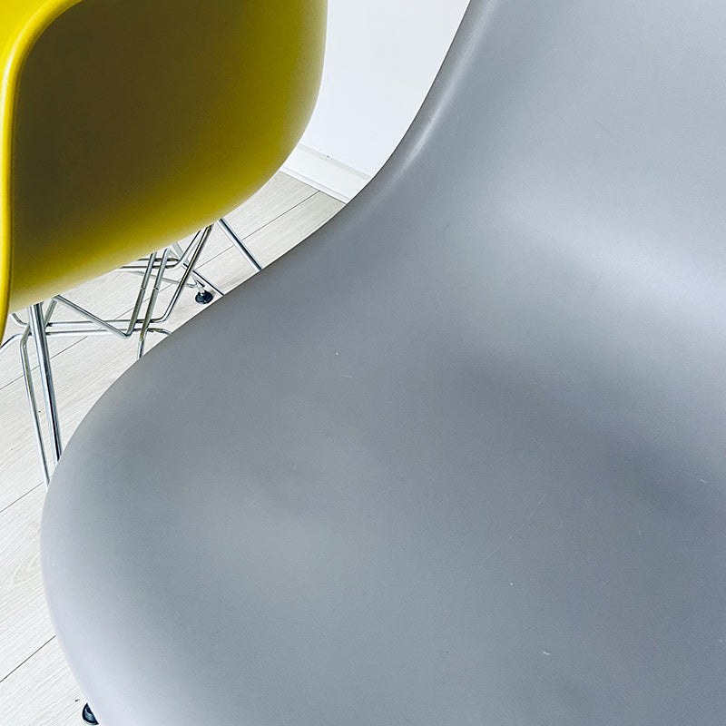 Mustard vintage Vitra, Charles and Ray Eames, DAR Plastic Armchair, USA / Germany, 2009